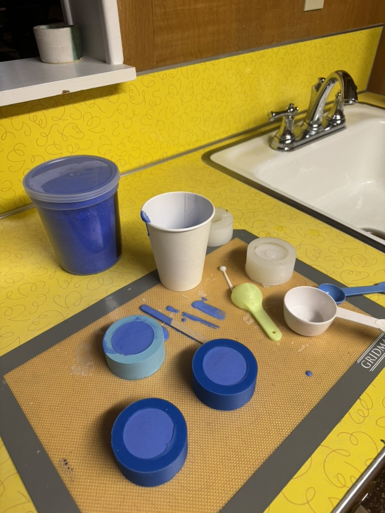 Cast Candle Holder - Silicone molds + pigmented resin on the bench