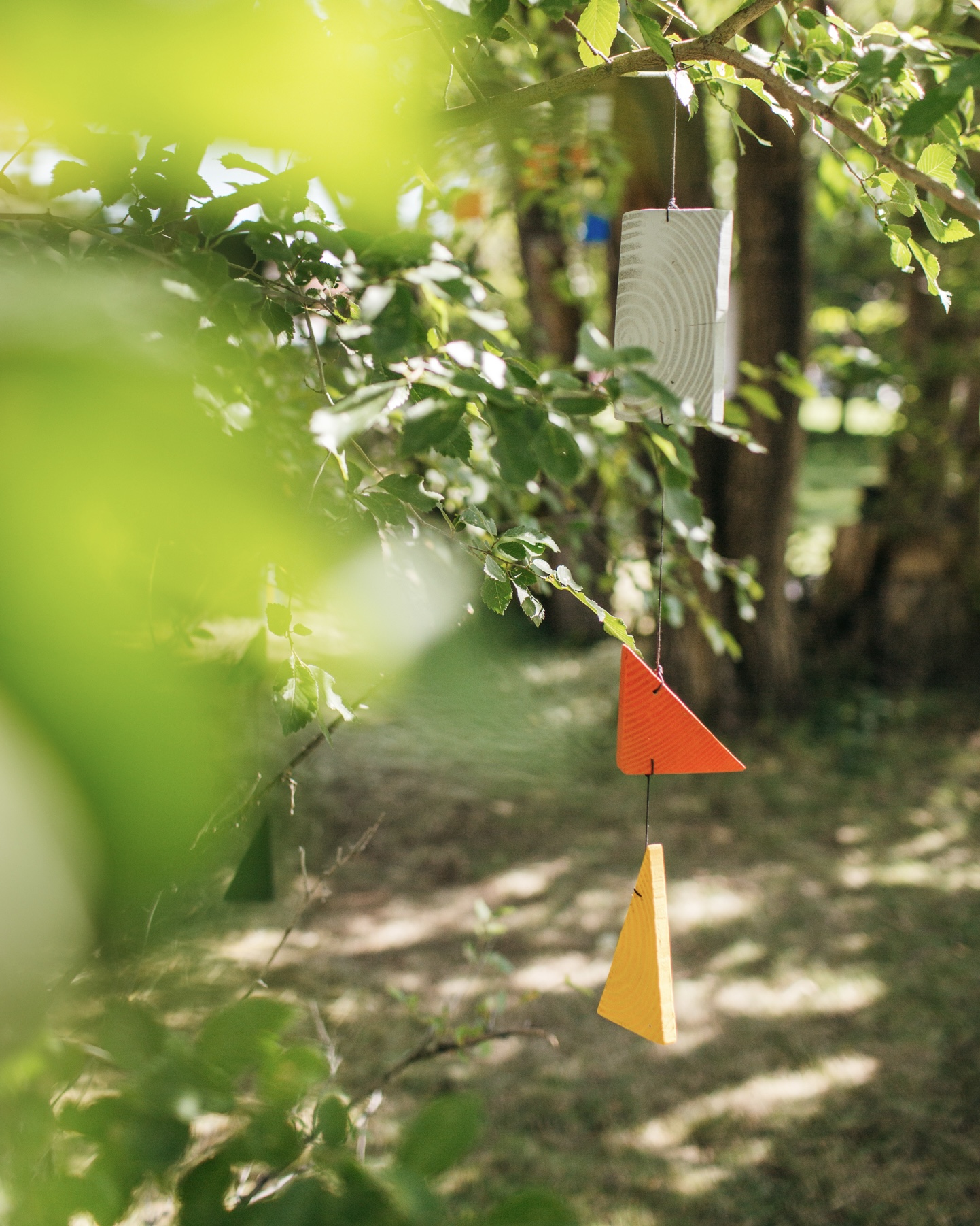 Canyon Vibration Mobiles - Tucked into the orchard canopy