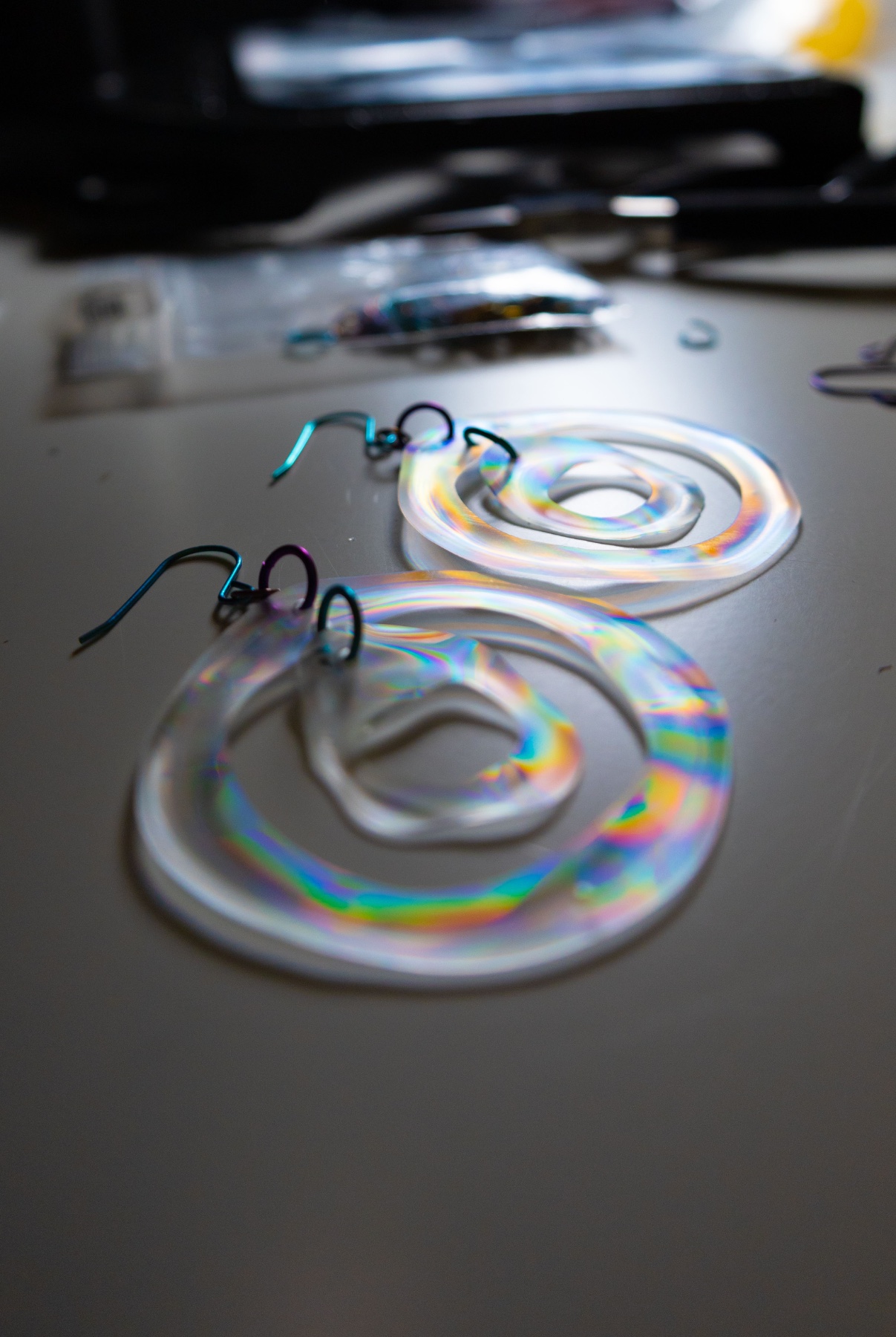Diffraction Earrings - Full-spectrum split across the faces