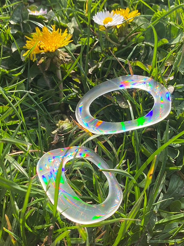 Diffraction Earrings - The pair in sunlight, full-spectrum diffraction