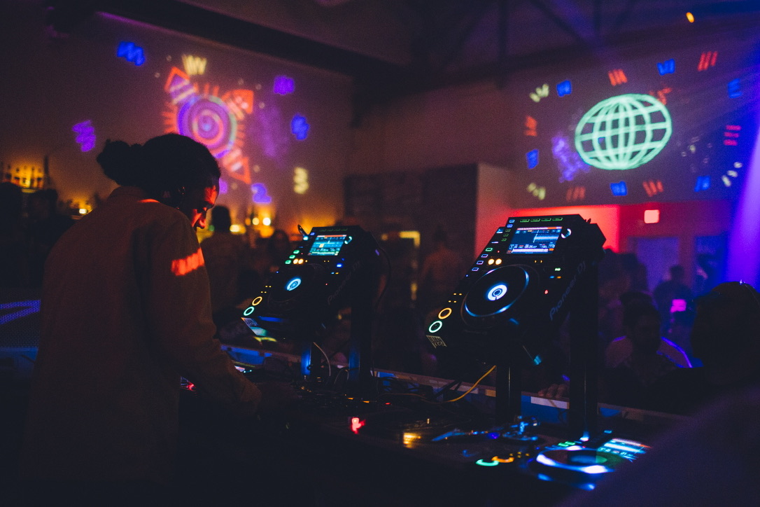 Mike Dunn - VJ projections behind the decks - photo by Drew Cornwall