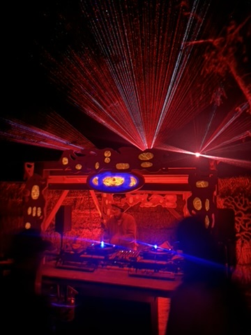 Osmosis in the Trees 2025 - Lasers fanning over the booth