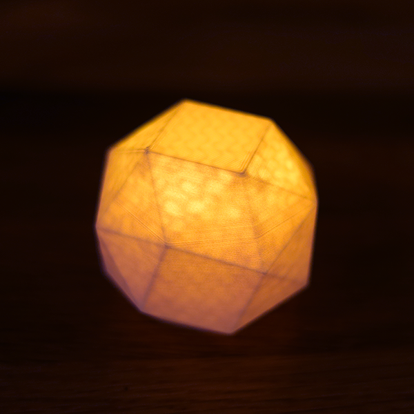Geo Candle - Cubic infill, lit — orthogonal grid through the facets
