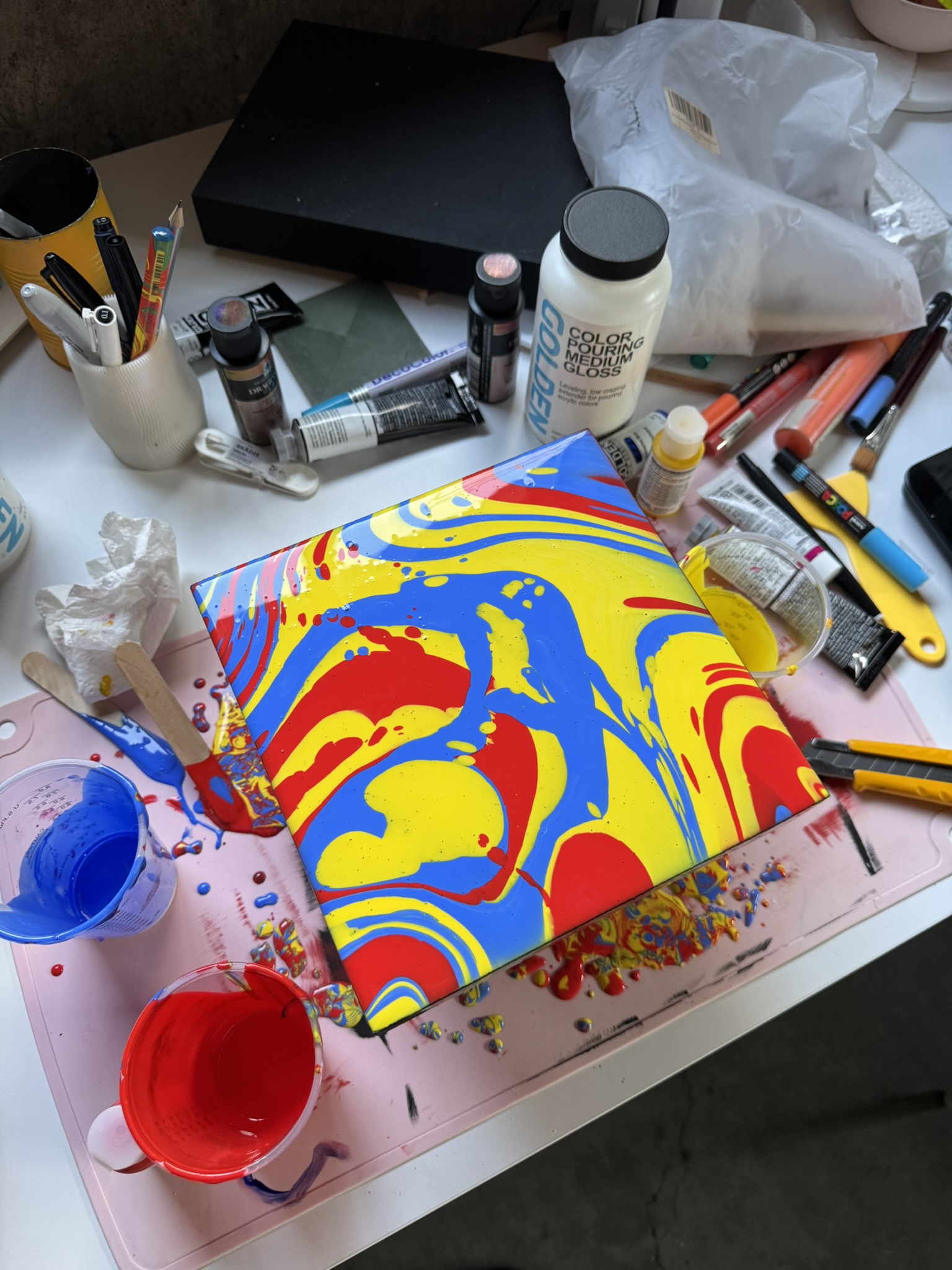 Acrylic Paint Pour - The poured panel, primaries marbled