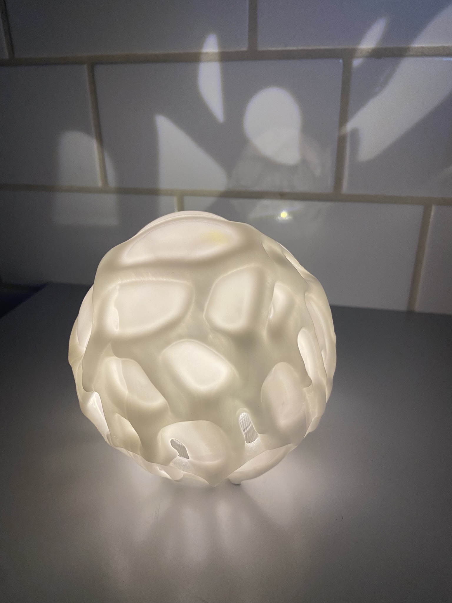 Voronoi Sphere - Finished sphere glowing on the counter