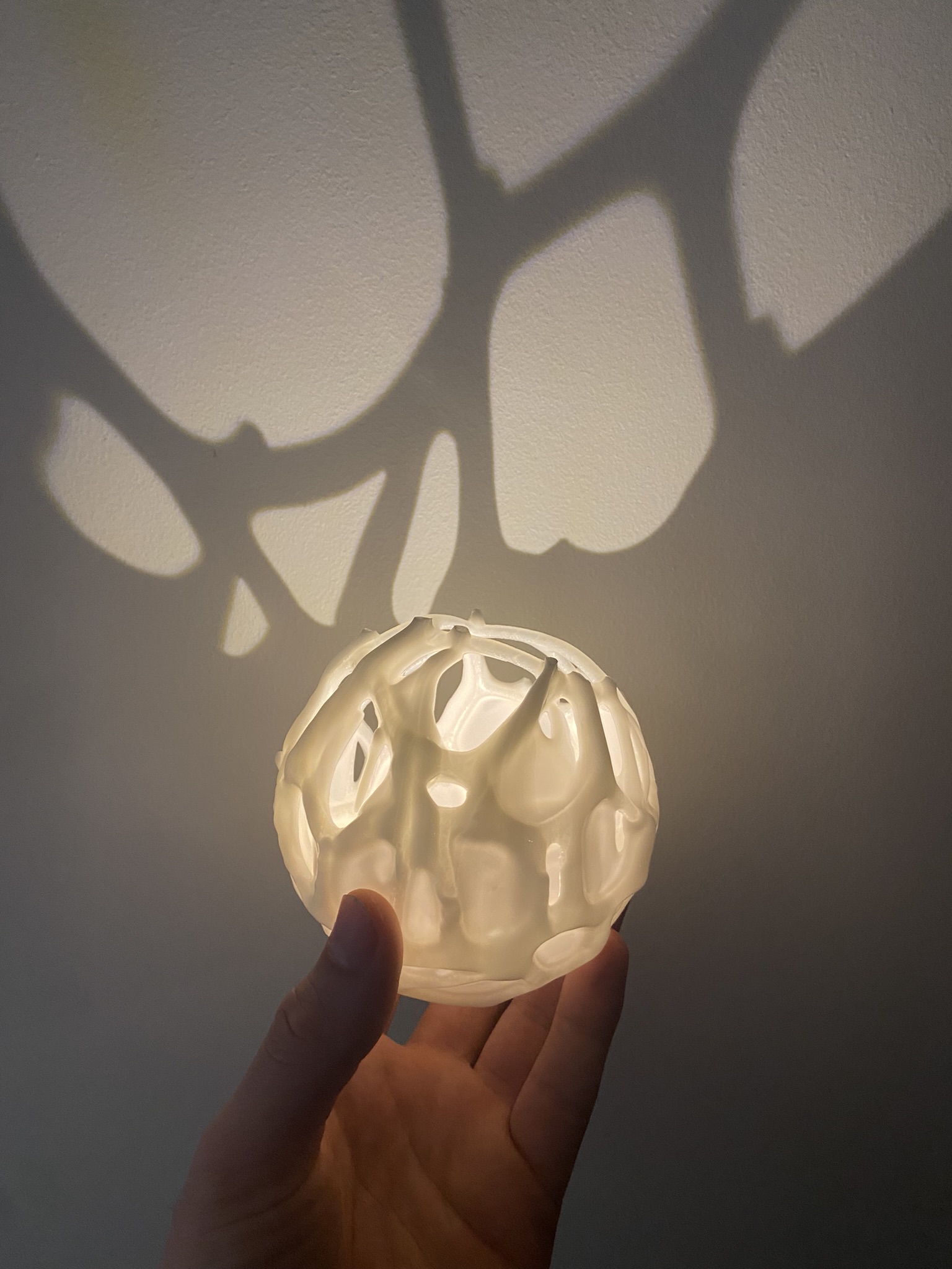 Voronoi Sphere - Lit from inside, voronoi shadows across the wall